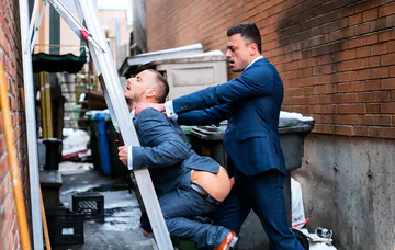 Men having sex in an alley