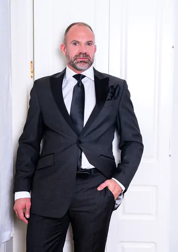 Well dressed guys having a threesome