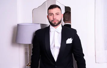 Well dressed guys having a threesome