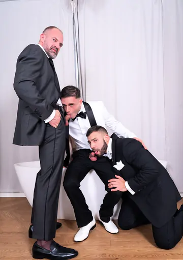 Well dressed guys having a threesome