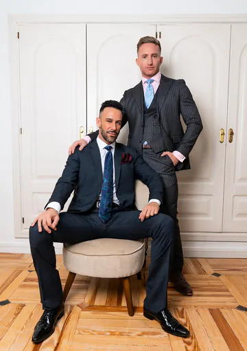 Gays in suits having sex