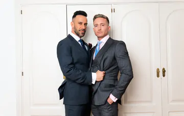 Gays in suits having sex