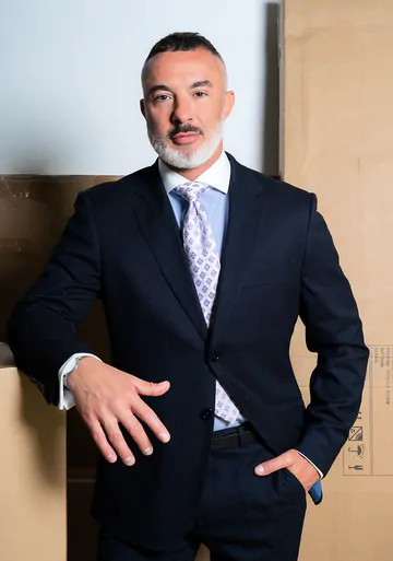 Men in a warehouse having sex