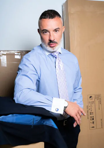 Men in a warehouse having sex