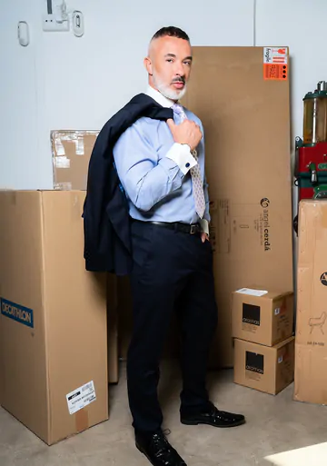 Men in a warehouse having sex