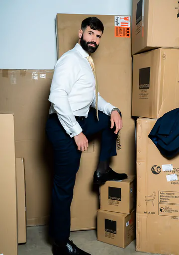 Men in a warehouse having sex