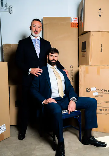 Men in a warehouse having sex