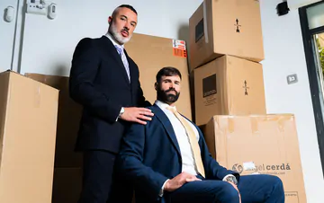 Men in a warehouse having sex