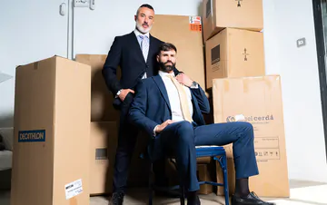 Men in a warehouse having sex