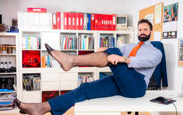 Men in an office having sex