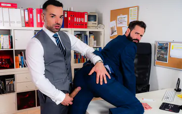 Men in an office having sex