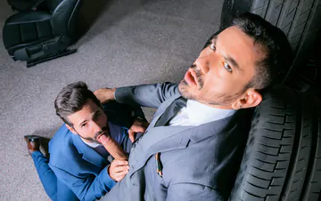 Car salesmen having gay sex