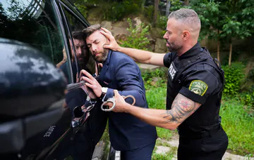 Sexy police man fucking a guy