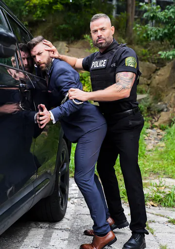 Sexy police man fucking a guy