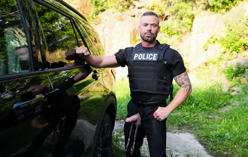 Sexy police man fucking a guy