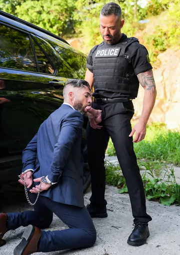Sexy police man fucking a guy