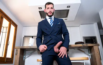 Men in a kitchen having sex