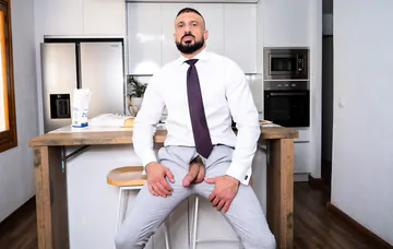 Men in a kitchen having sex