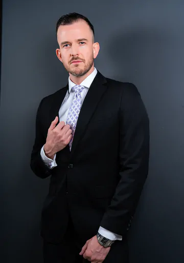 Men in suits having gay sex