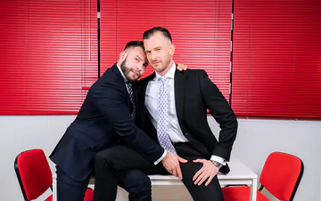 Men in suits having gay sex