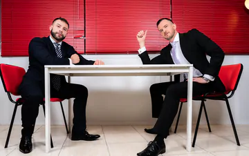 Men in suits having gay sex