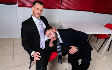 Men in suits having gay sex