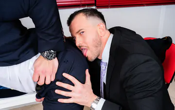 Men in suits having gay sex