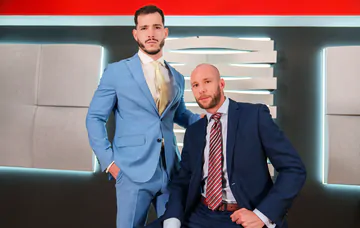 Gays in suits having sex