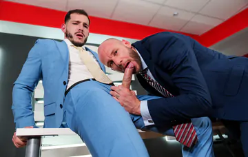 Gays in suits having sex