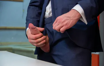 Men in a laundry having sex