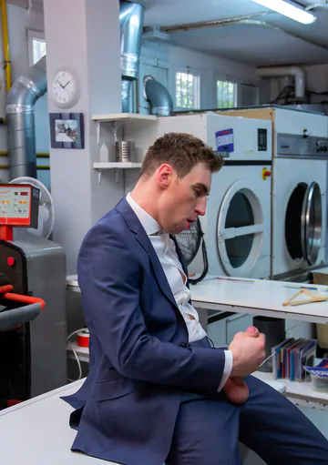 Men in a laundry having sex
