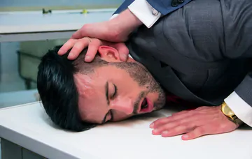 Men in a laundry having sex