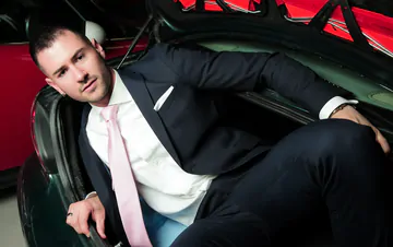 Guys in suits having sex