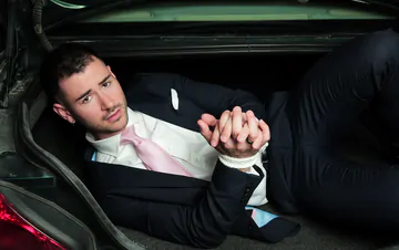 Guys in suits having sex