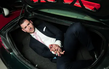 Guys in suits having sex