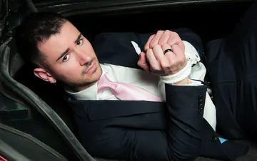 Guys in suits having sex