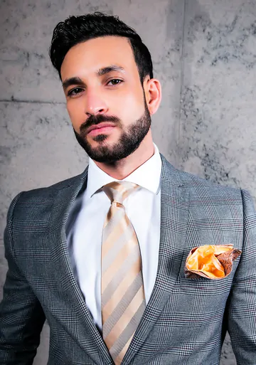 Men in suits fucking on a sofa