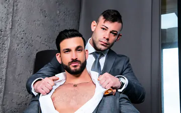 Men in suits fucking on a sofa