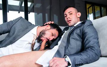 Men in suits fucking on a sofa