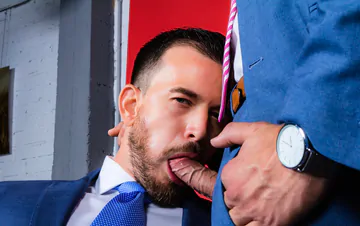 Men in blue suits having sex