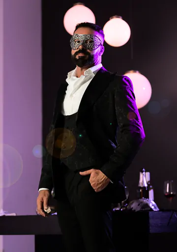 Masquerade ball men having sex