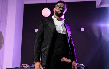 Masquerade ball men having sex