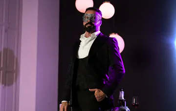 Masquerade ball men having sex