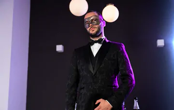 Masquerade ball men having sex