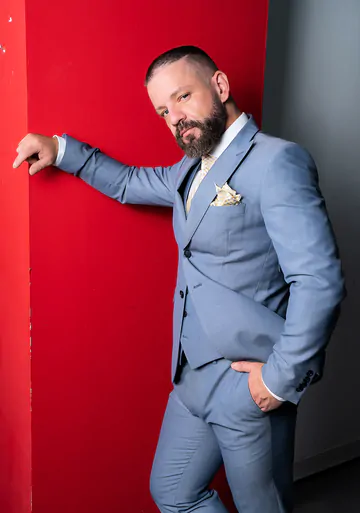 Men in a garage having sex