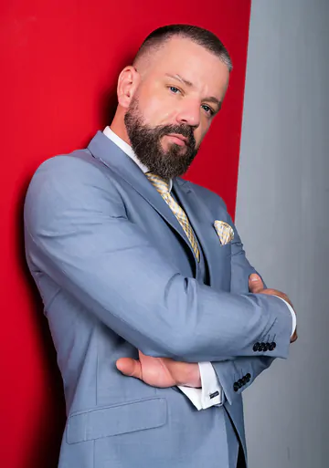 Men in a garage having sex