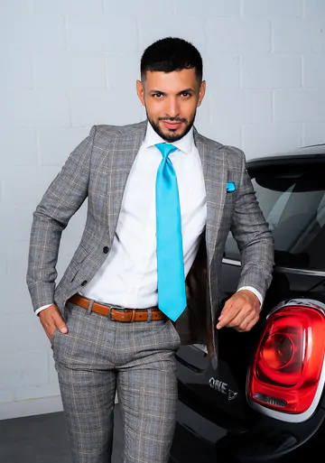 Men in a garage having sex