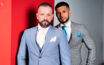 Men in a garage having sex