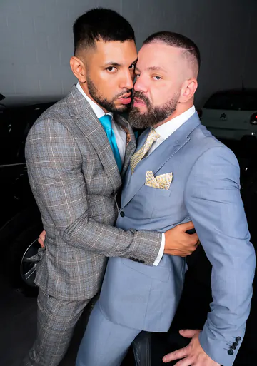 Men in a garage having sex