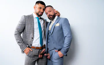 Men in a garage having sex